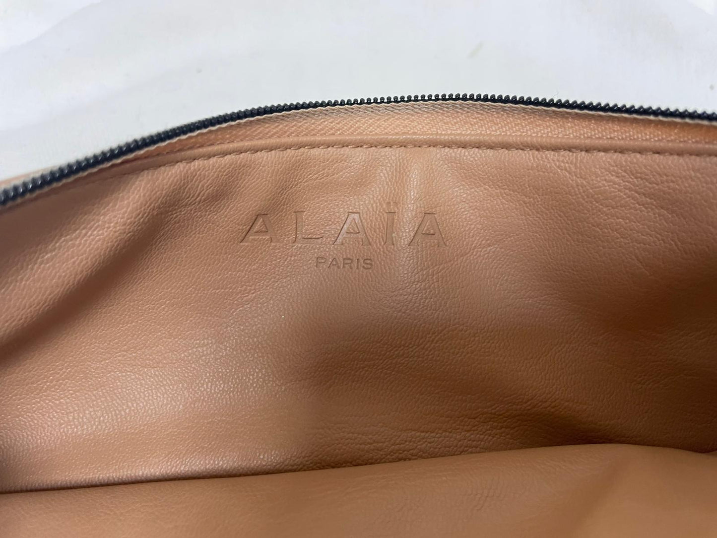 ALAÏA Paris Blush Peach Vegan Leather Zip Top Pouch Purse