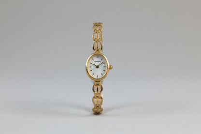 Vintage Ladies Sekonda gold tone watch with Oval Mother of Pearl face and intricate linked Bracelet