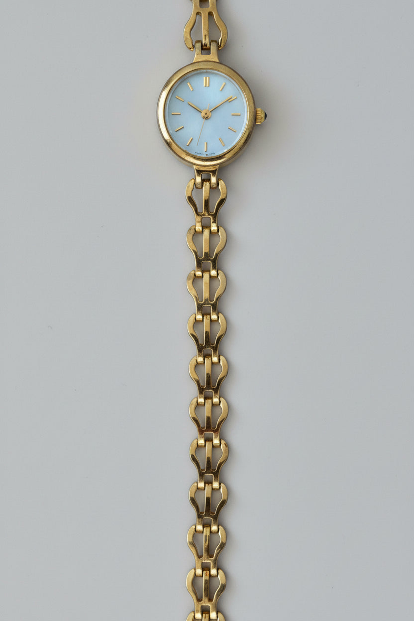 Vintage Ladies Sekonda gold tone watch with Oval Mother of Pearl face and intricate linked Bracelet