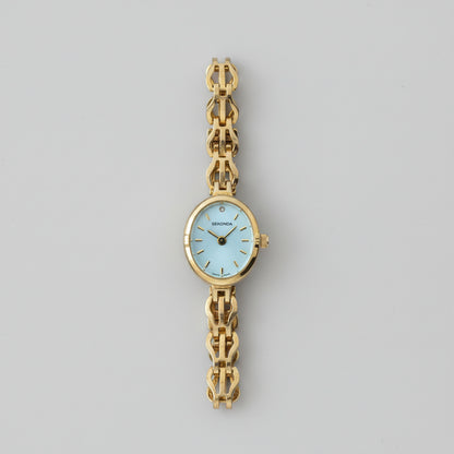 Vintage Ladies Sekonda gold tone watch with Oval Mother of Pearl face and intricate linked Bracelet