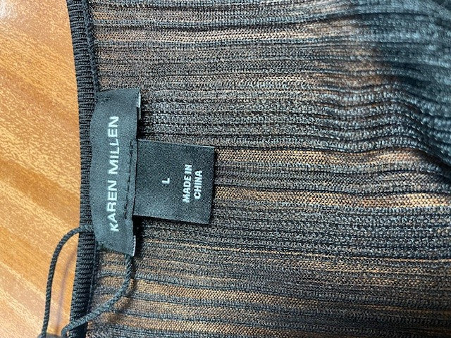 Black Karen Millen Dress size L with sheer Sleeves and shoulders