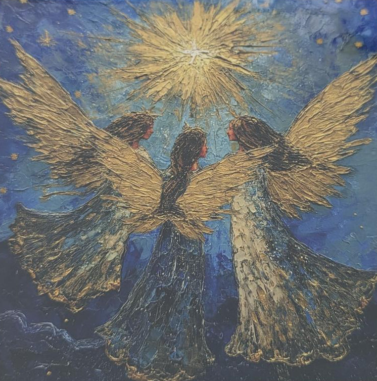 A square art print or coaster featuring two angels with wings illuminated by a bright star, sealed in a clear protective sleeve and placed on a light wood surface.
