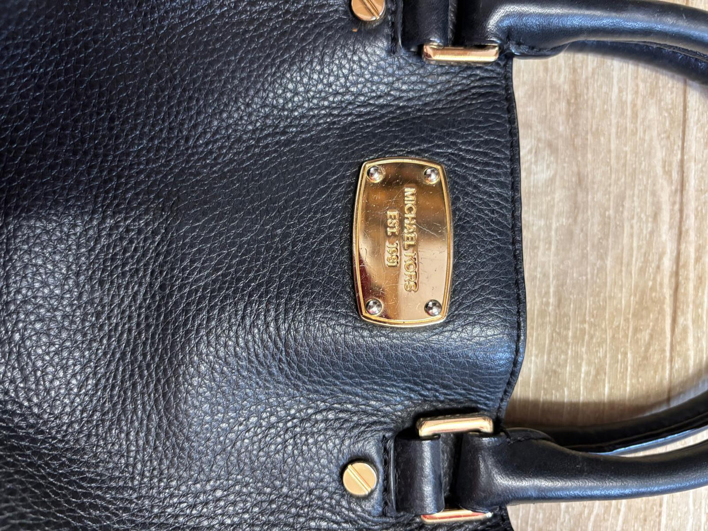 Michael Kors Black Leather Handbag with Gold Metalwork